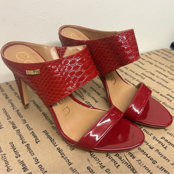 CALVIN KLEIN: ‘Shayna’ PVC Red Mule Heel Sandal - Picture 1 of 4
